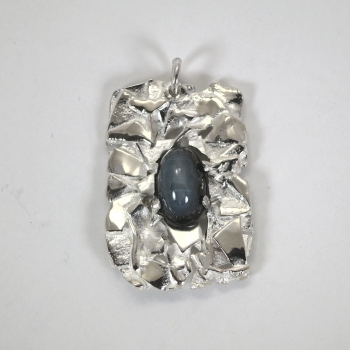 Fused silver pendant with sapphire